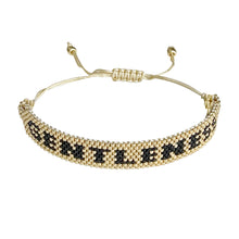 Load image into Gallery viewer, Gentleness Gold and Black beaded adjustable bracelet.
