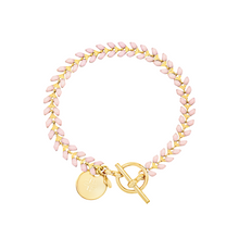 Load image into Gallery viewer, Vine gold-plated bracelet with pink enamel, toggle, and disc charm with cross