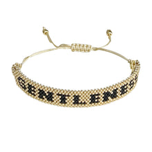 Load image into Gallery viewer, Gentleness Gold and Black beaded adjustable bracelet.
