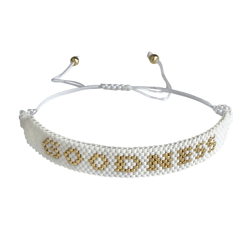 Goodness Gold and White beaded adjustable bracelet.