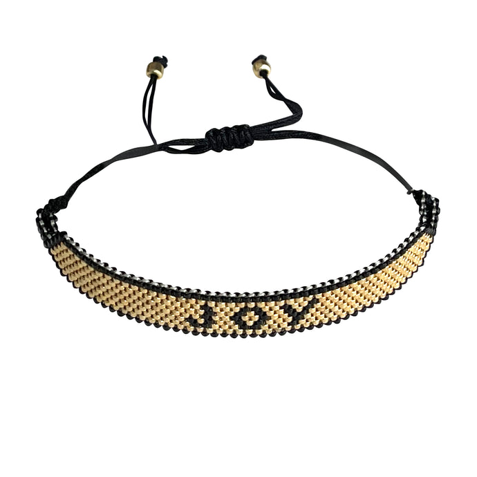 Joy Gold and Black beaded adjustable bracelet.