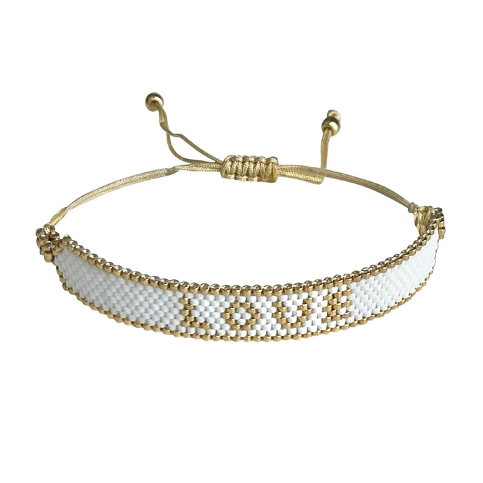 Love Gold and White beaded adjustable bracelet.