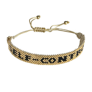 Self-Control Gold and Black beaded adjustable bracelet.
