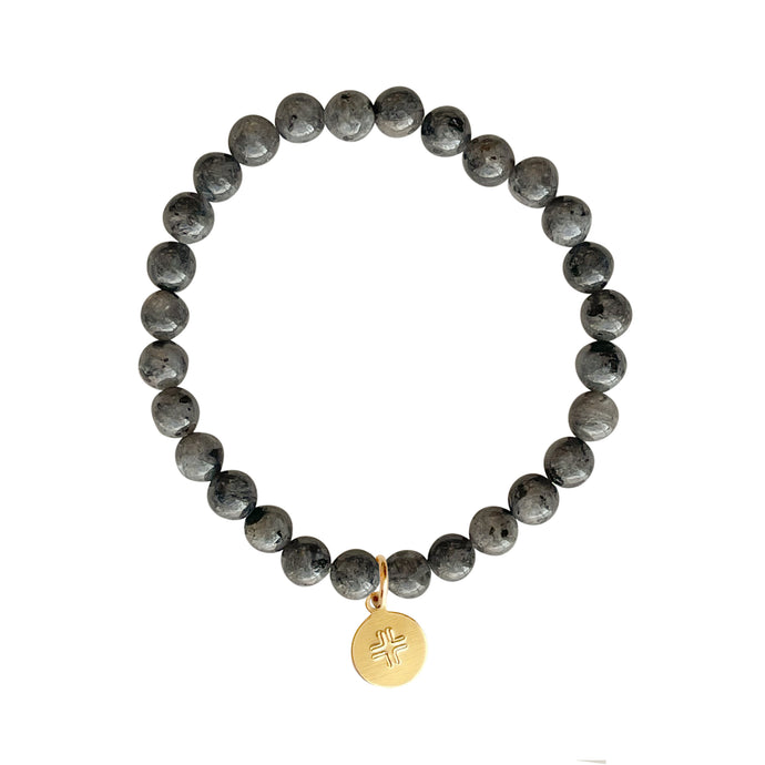 Black Jasper stone stretch bracelet with gold disc charm with stamped cross.