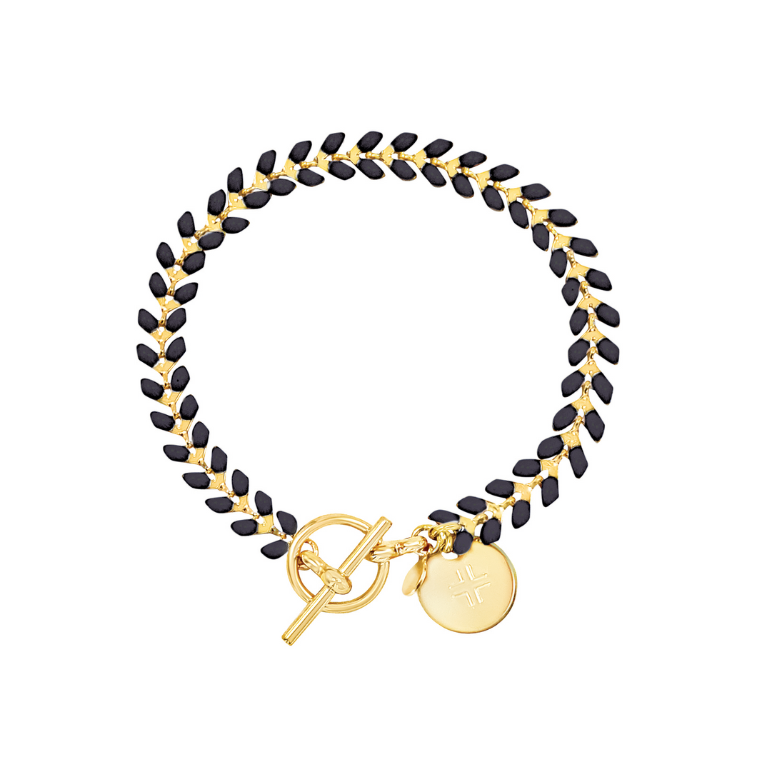 Vine gold-plated bracelet with black enamel, toggle, and disc charm with cross