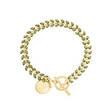 Load image into Gallery viewer, Vine gold-plated bracelet with olive green enamel, toggle, and disc charm with cross

